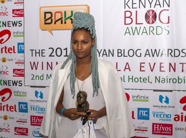 Silvia Njoki posing with her Kenyan Blog of the Year 2015 winner's trophy.